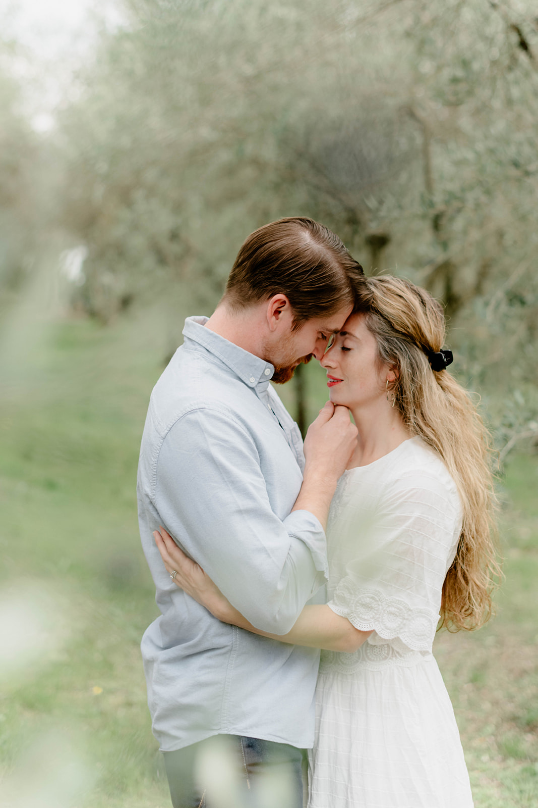 Lauren and Matt in the olive grove at Villa Cetinale in Tuscany.